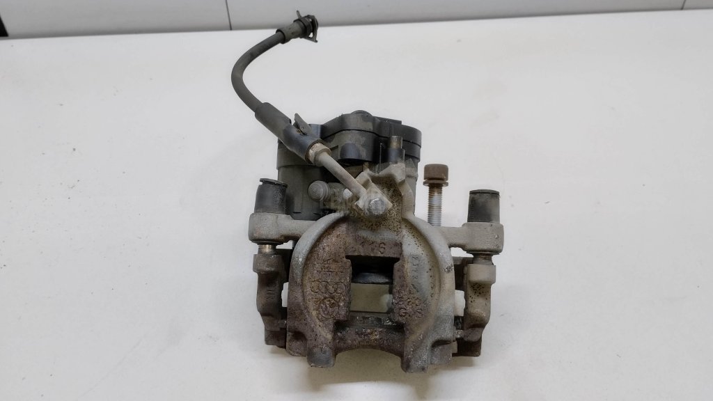 Суппорт тормозной задний правый