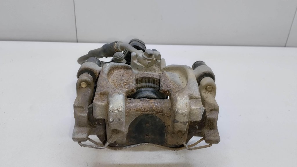 Суппорт тормозной задний правый