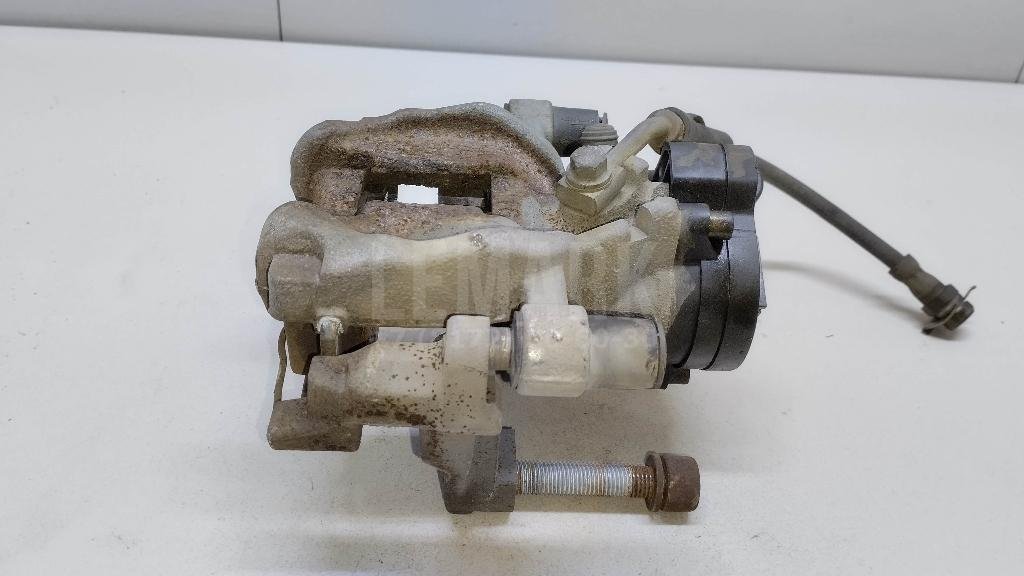 Суппорт тормозной задний правый