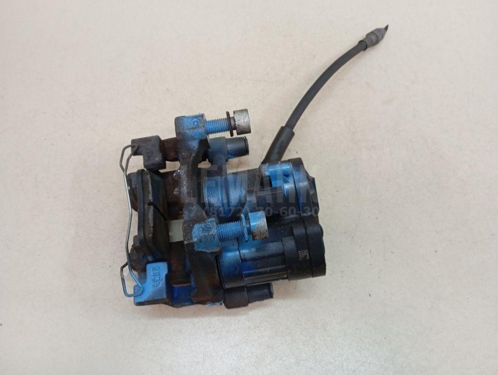 Суппорт тормозной задний правый