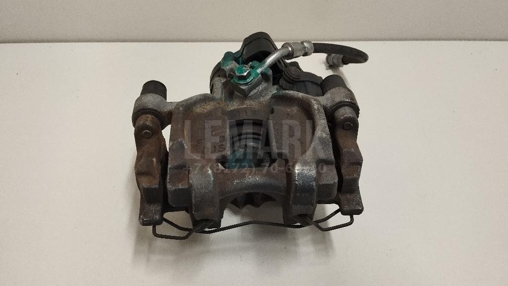 Суппорт тормозной задний левый