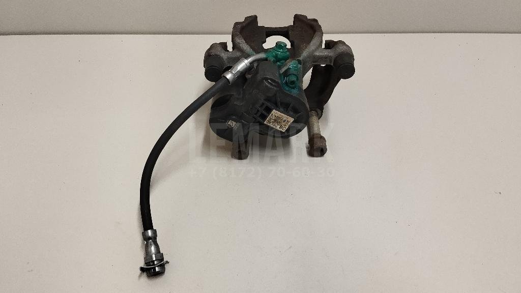 Суппорт тормозной задний левый