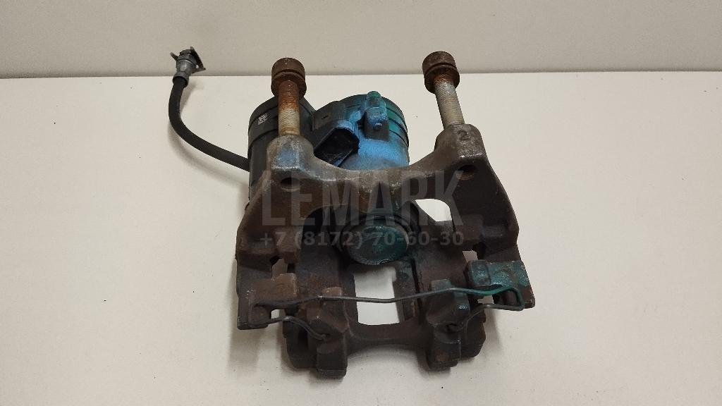 Суппорт тормозной задний левый