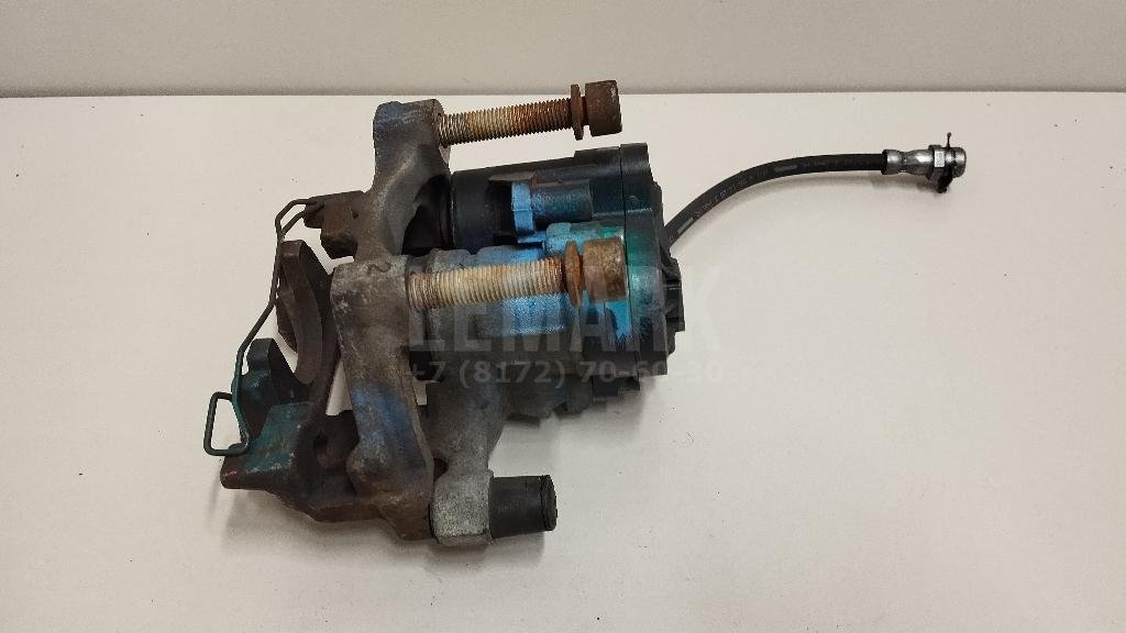 Суппорт тормозной задний левый