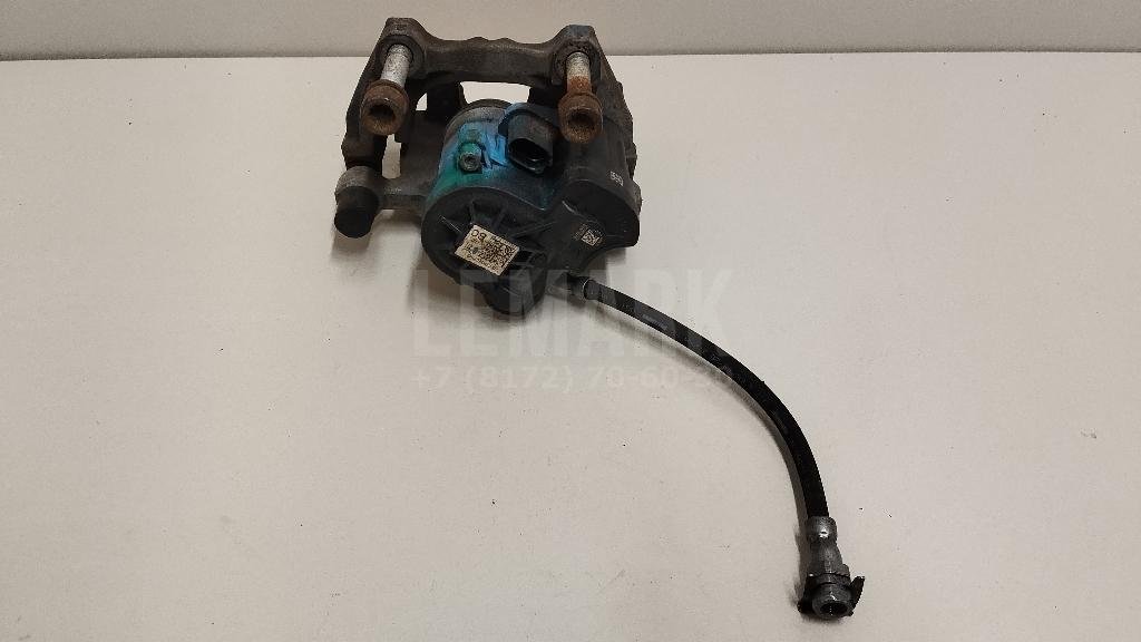 Суппорт тормозной задний левый