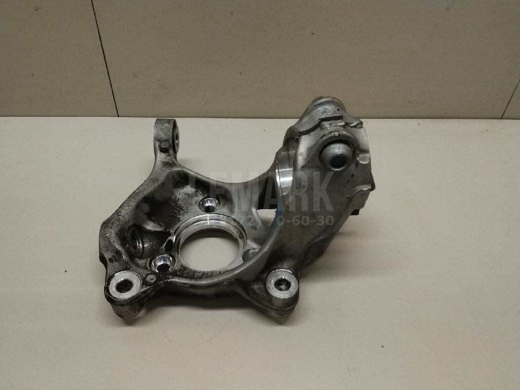 Кулак поворотный передний левый