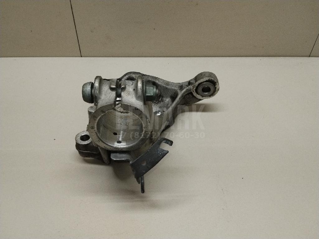 Кулак поворотный передний левый