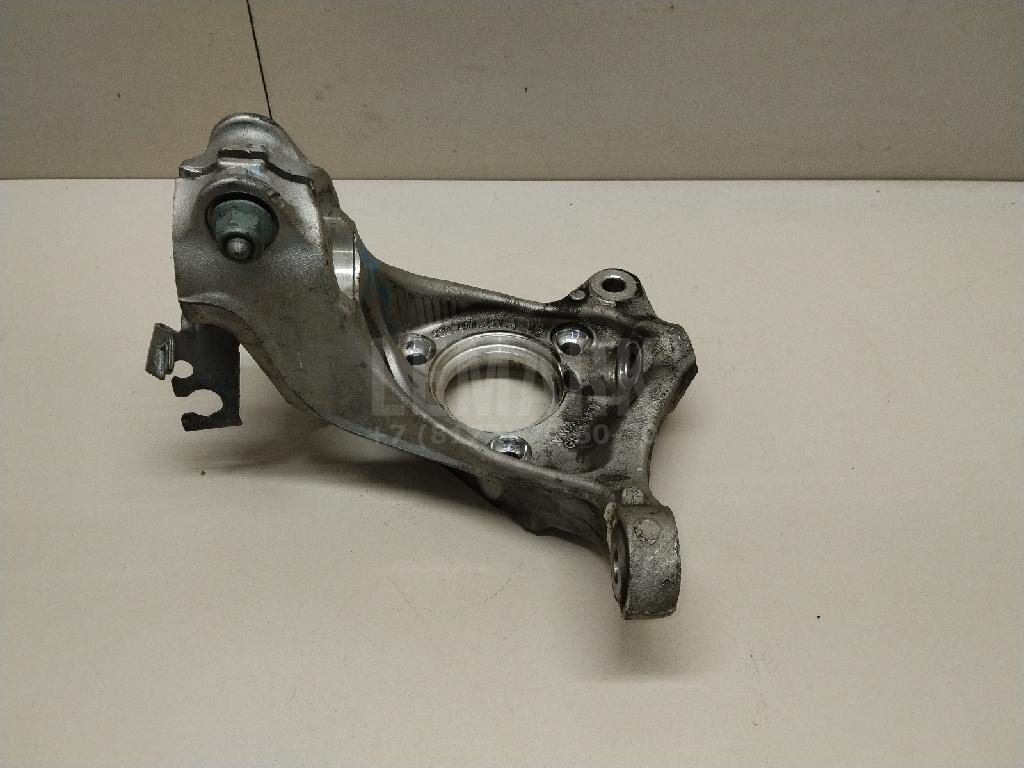 Кулак поворотный передний левый