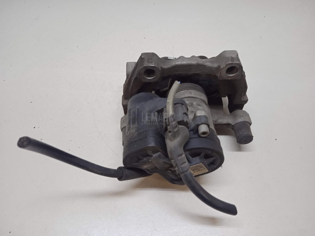 Суппорт тормозной задний правый