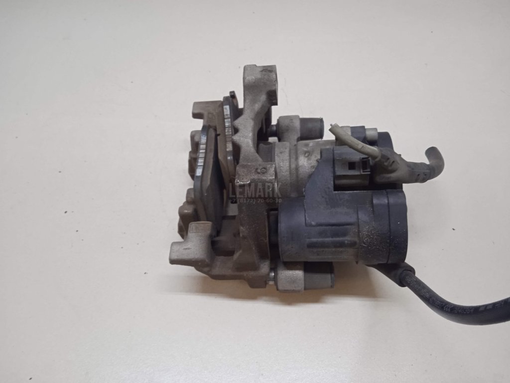 Суппорт тормозной задний правый