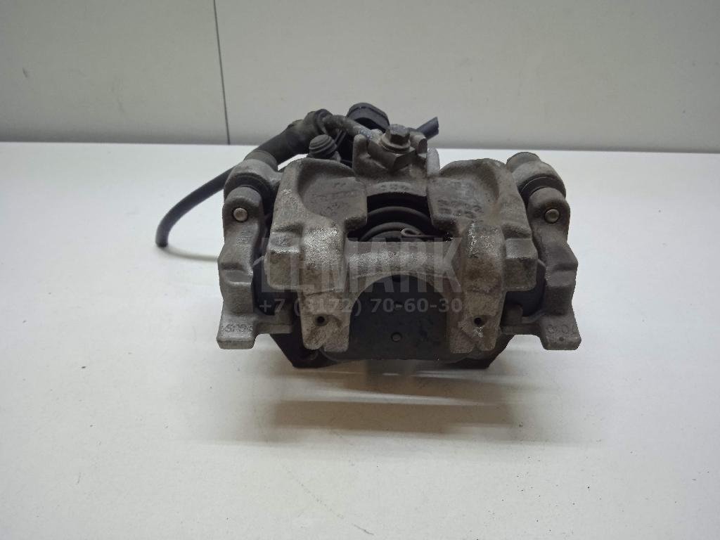 Суппорт тормозной задний правый