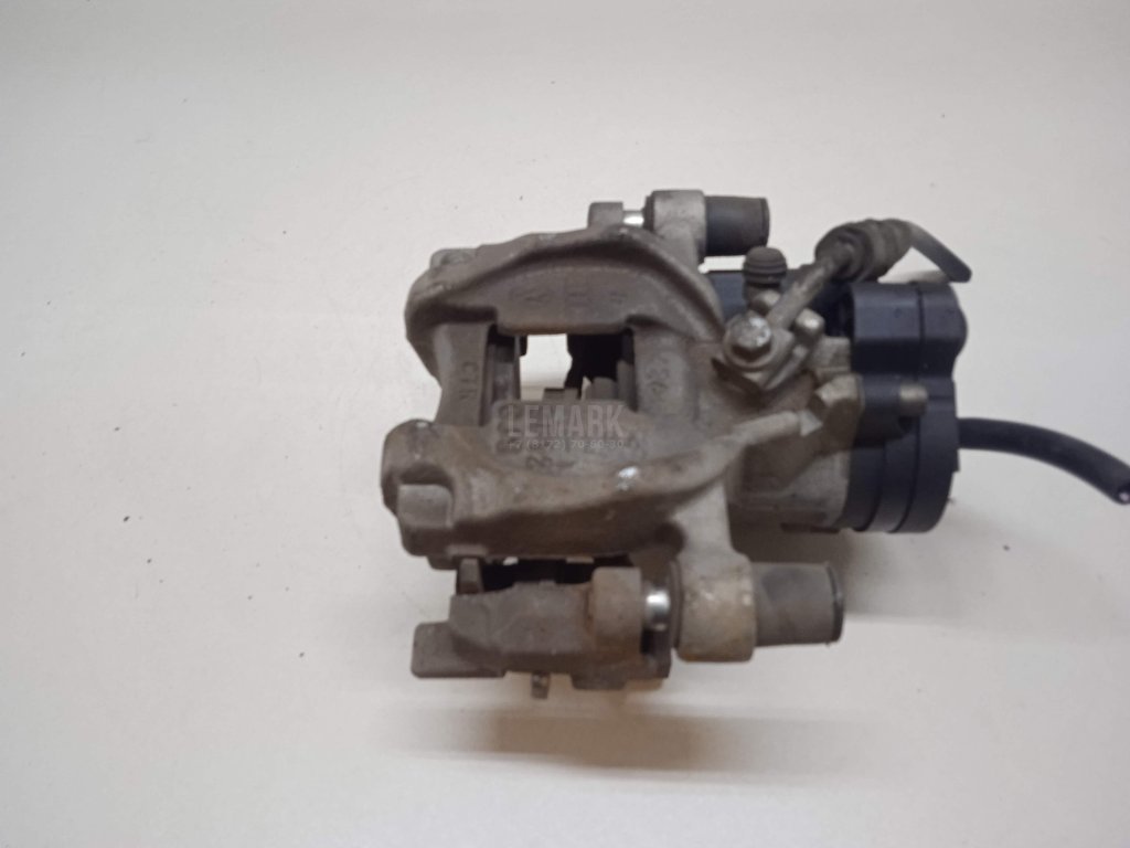 Суппорт тормозной задний правый