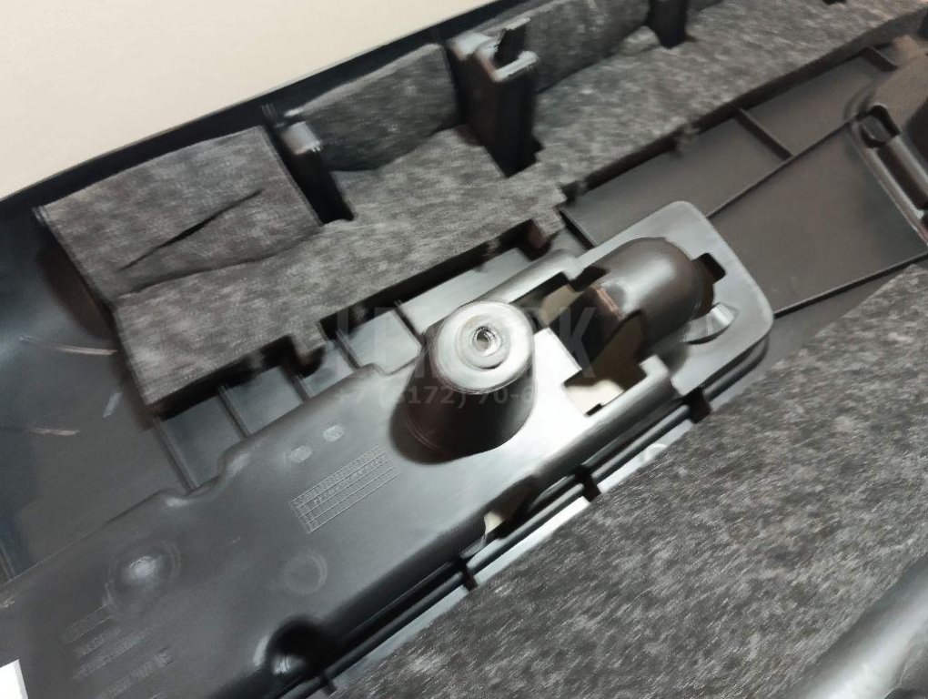 Обшивка двери багажника