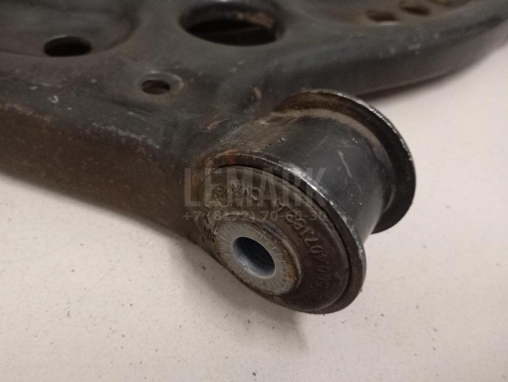 Рычаг передний правый