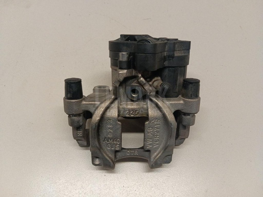 Суппорт тормозной задний левый