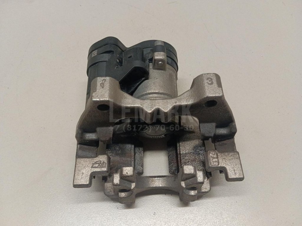 Суппорт тормозной задний левый