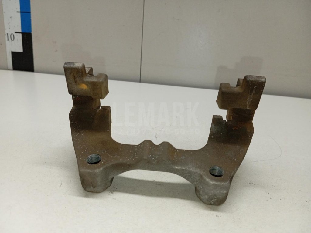 Скоба суппорта заднего