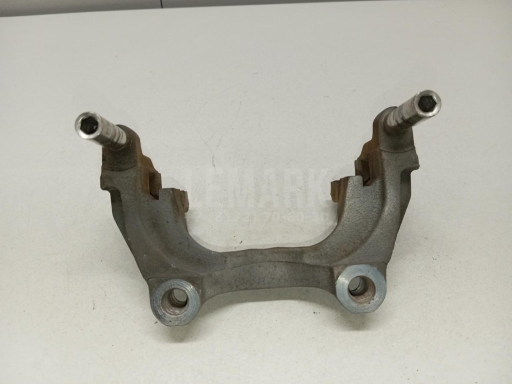 Скоба суппорта заднего