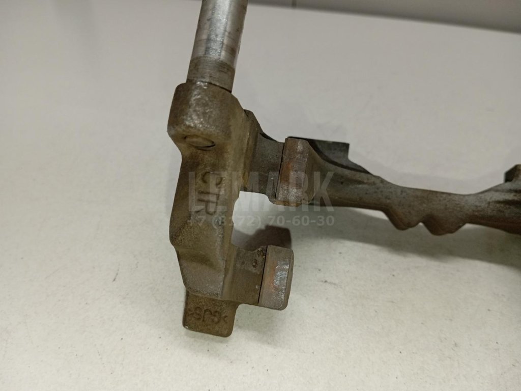 Скоба суппорта заднего