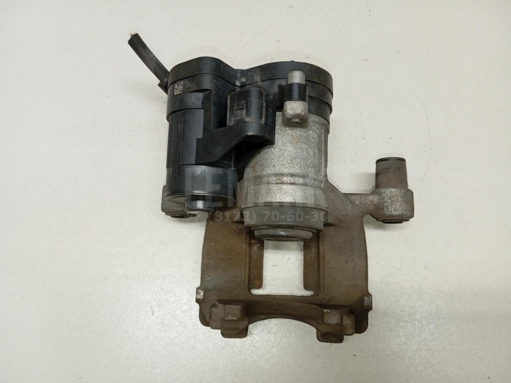 Суппорт тормозной задний левый