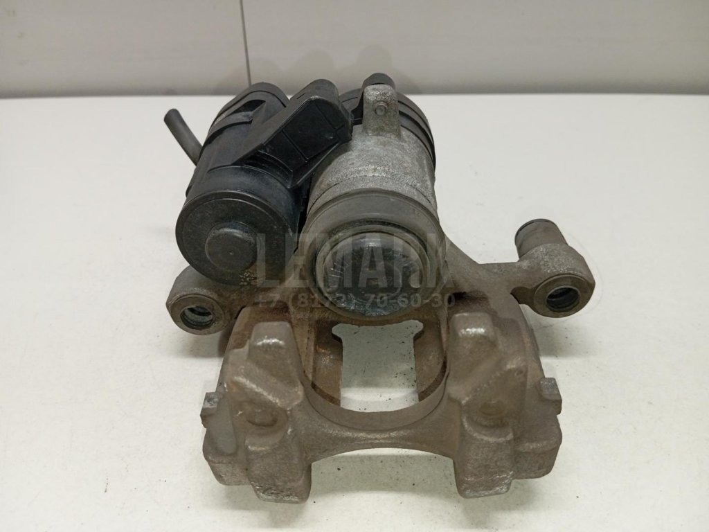 Суппорт тормозной задний левый