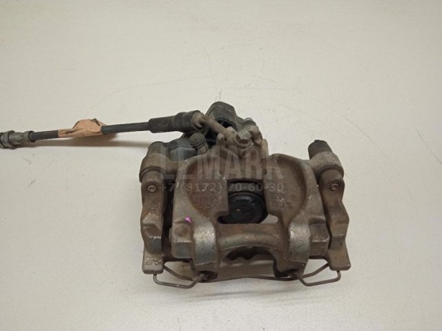 Суппорт тормозной задний правый