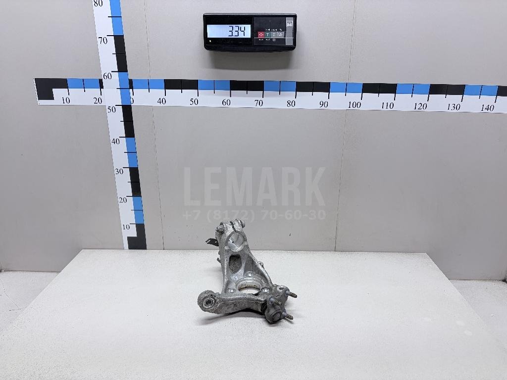 Кулак поворотный передний левый