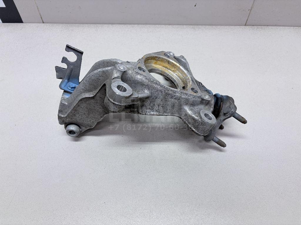 Кулак поворотный передний левый