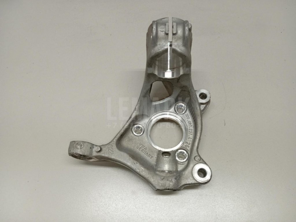 Кулак поворотный передний левый