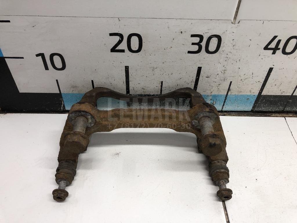 Скоба суппорта переднего левого