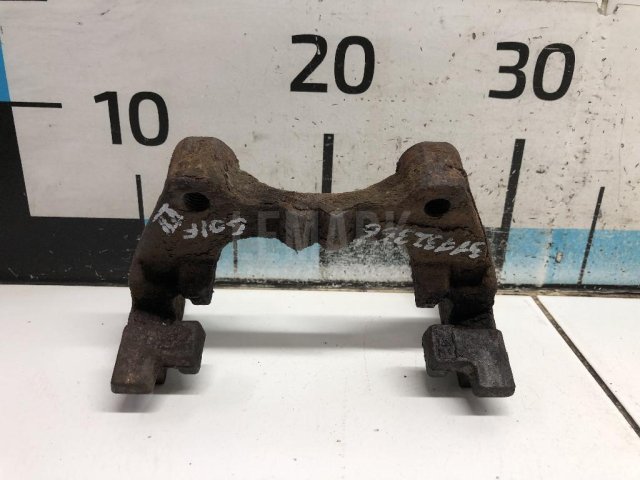 Скоба суппорта заднего