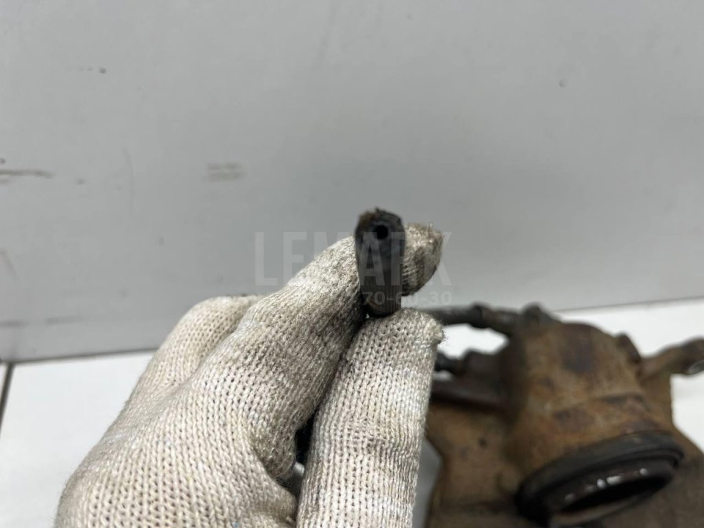 Суппорт тормозной передний левый