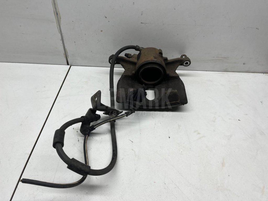 Суппорт тормозной передний левый