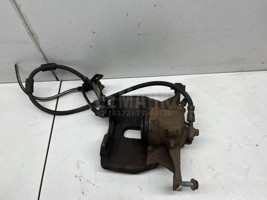 Суппорт тормозной передний левый