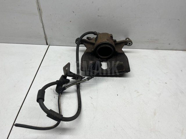 Суппорт тормозной передний левый