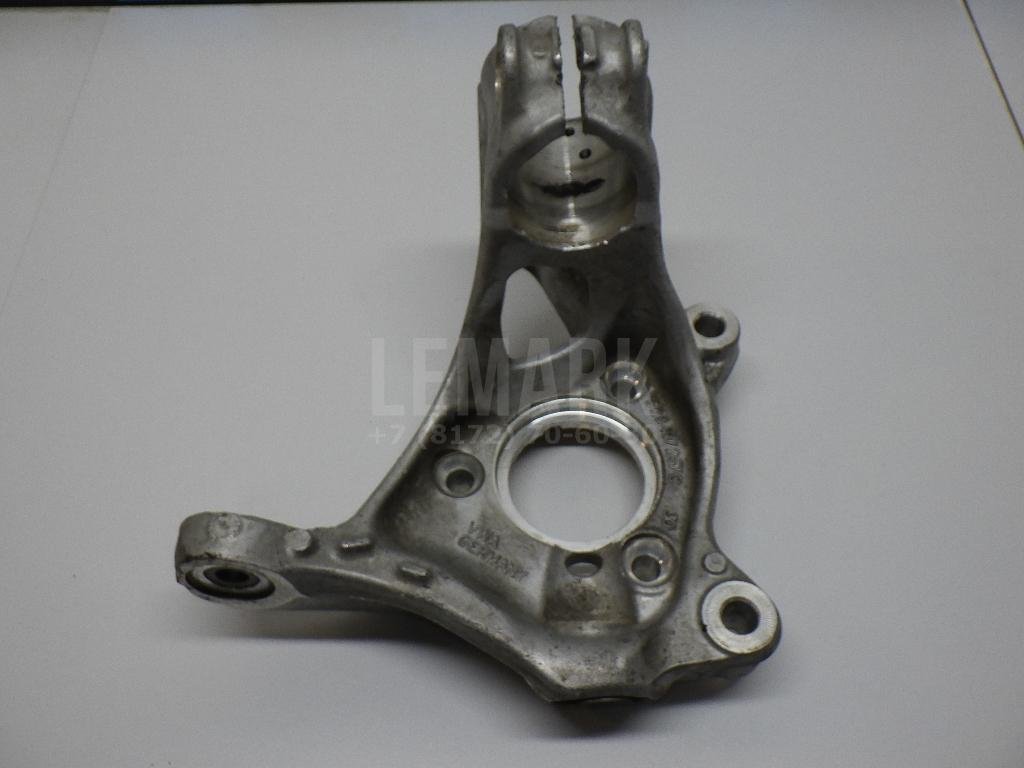 Кулак поворотный передний левый