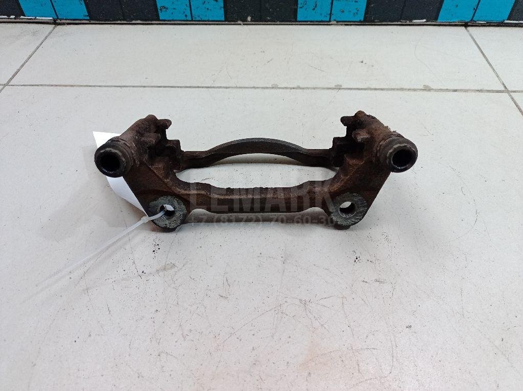 Скоба суппорта переднего левого