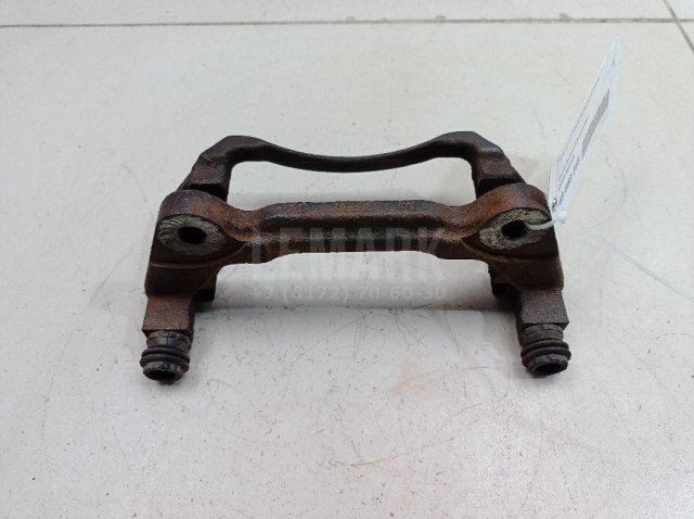 Скоба суппорта переднего левого