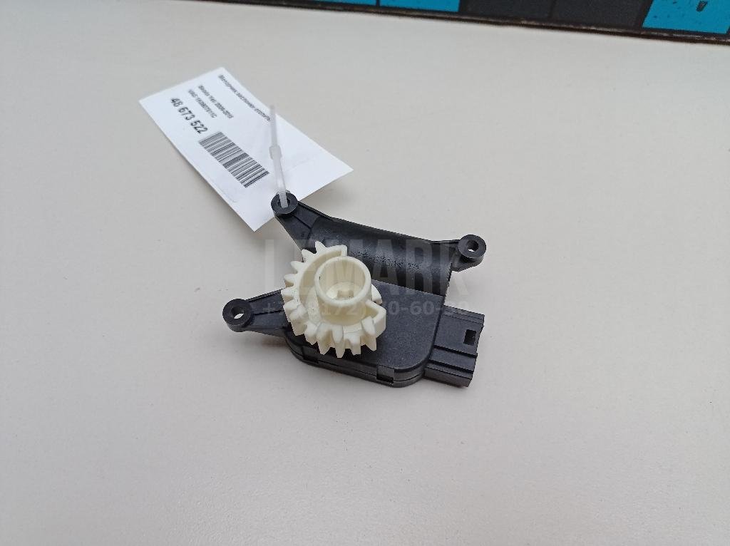 Моторчик заслонки отопителя