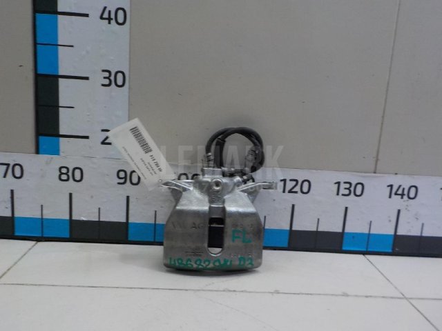 Суппорт тормозной передний левый