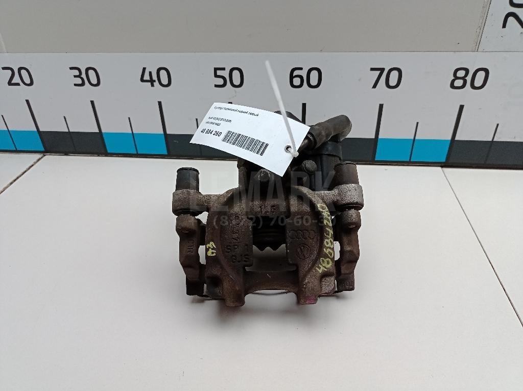 Суппорт тормозной задний левый