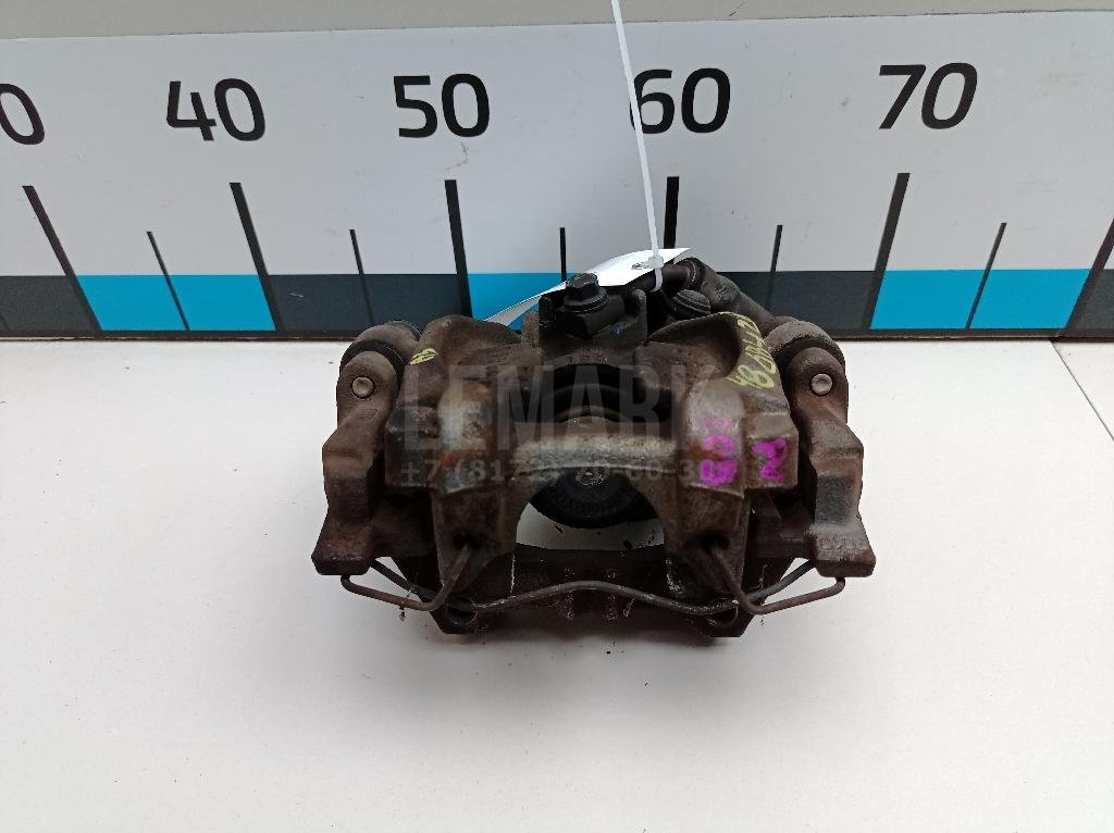 Суппорт тормозной задний левый