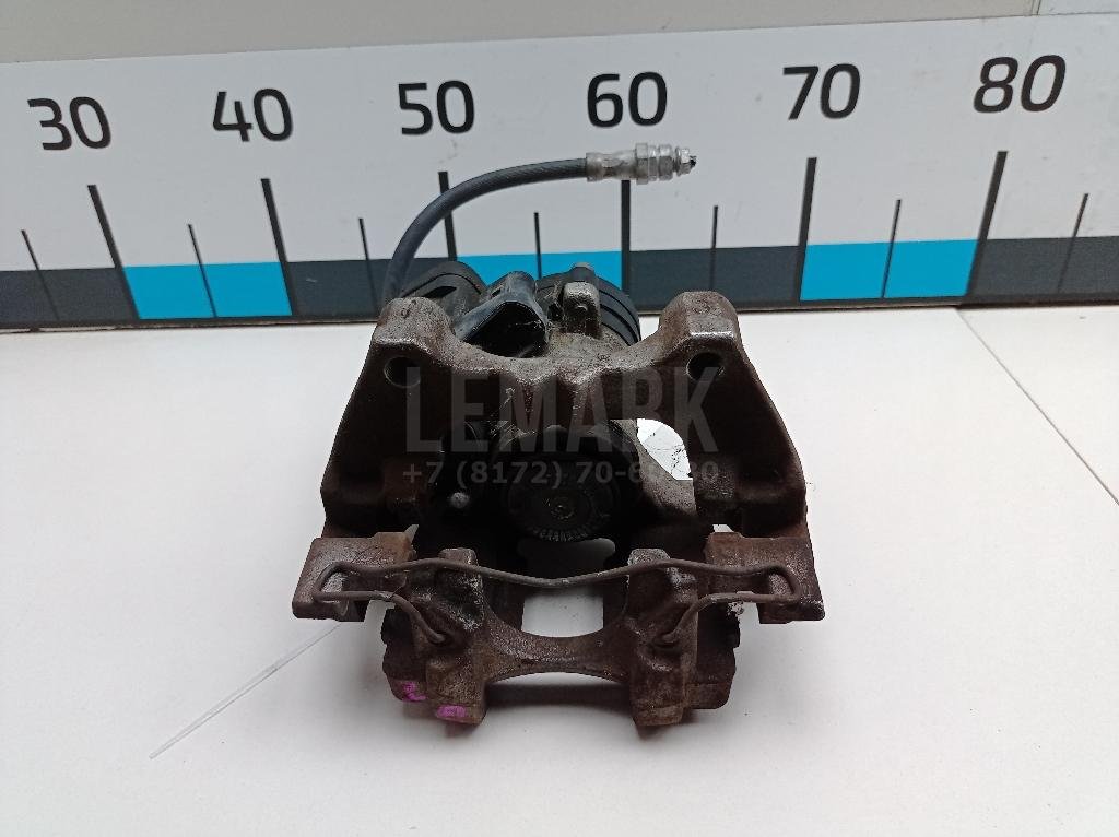 Суппорт тормозной задний левый