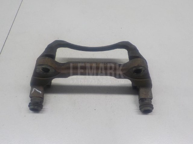 Скоба суппорта переднего левого