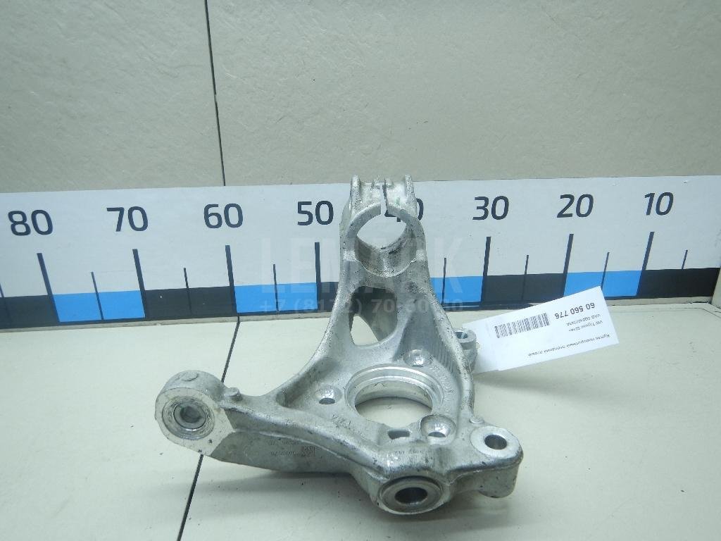 Кулак поворотный передний левый