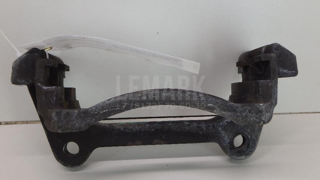 Скоба суппорта переднего левого