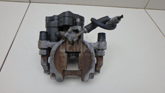 Суппорт тормозной задний правый