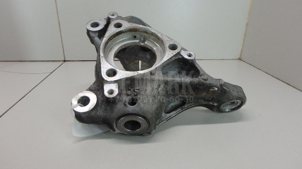 Кулак поворотный передний левый