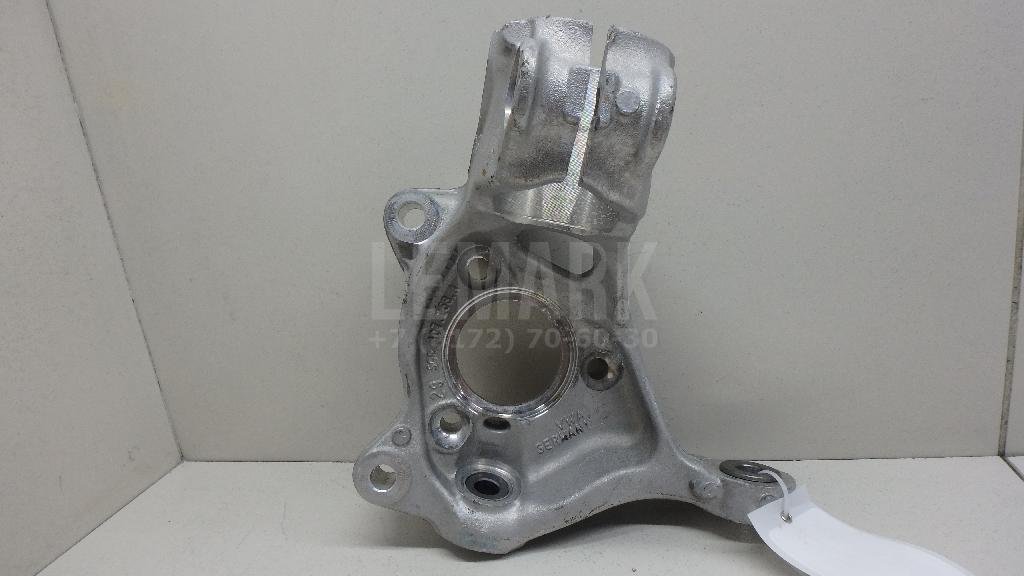 Кулак поворотный передний правый