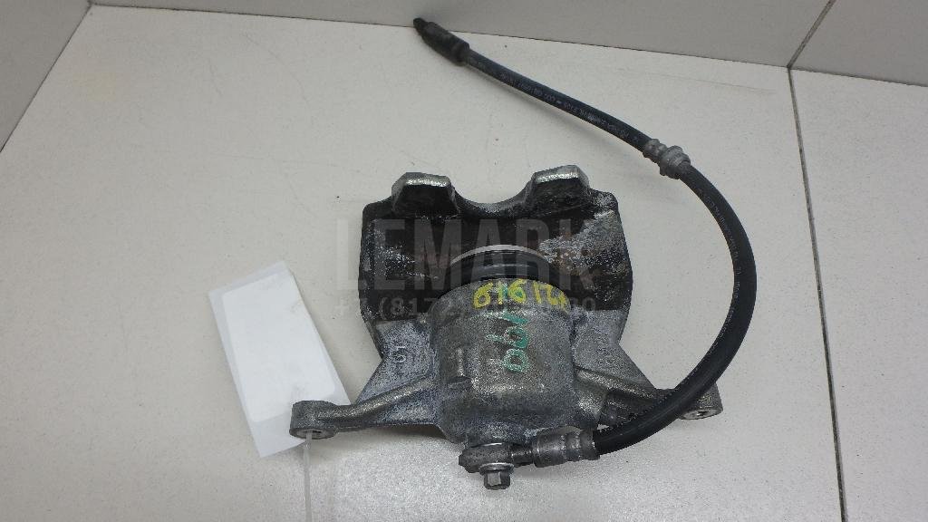 Суппорт тормозной передний левый